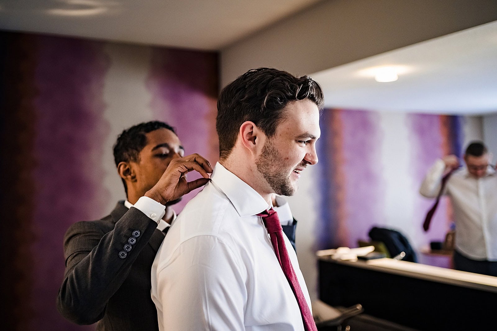 Groom getting ready before Angus Barn Wedding