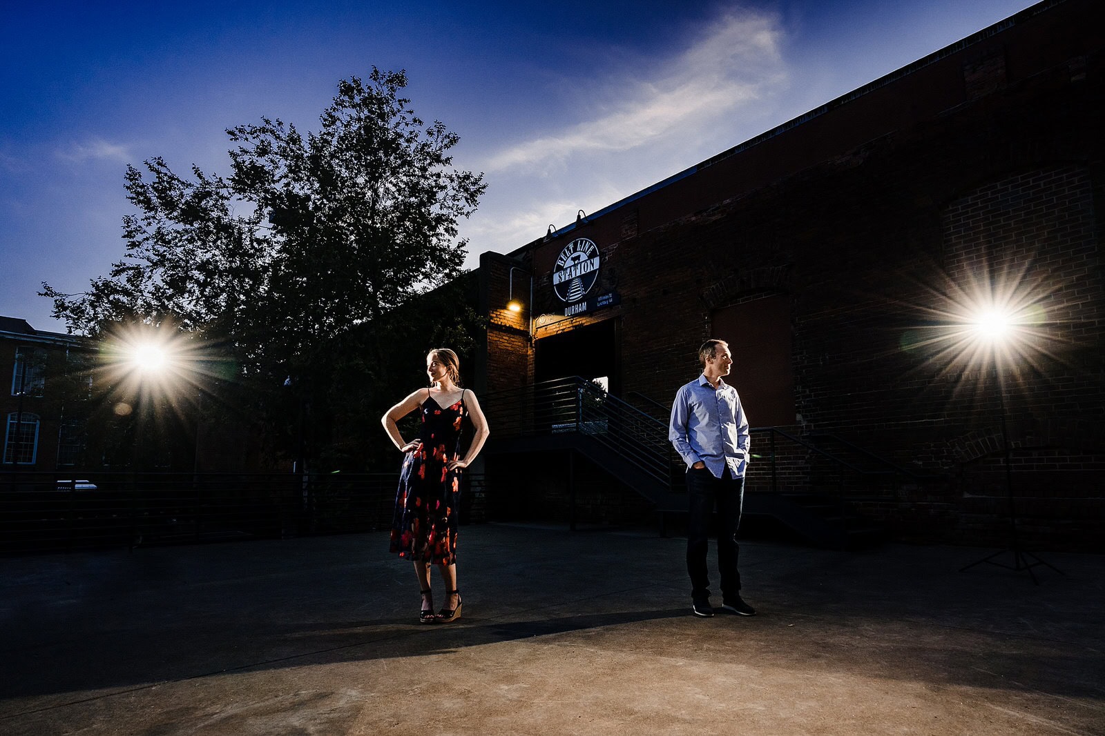 Dramatic and artistic engagement photos at Belt Line Station in Durham, NC