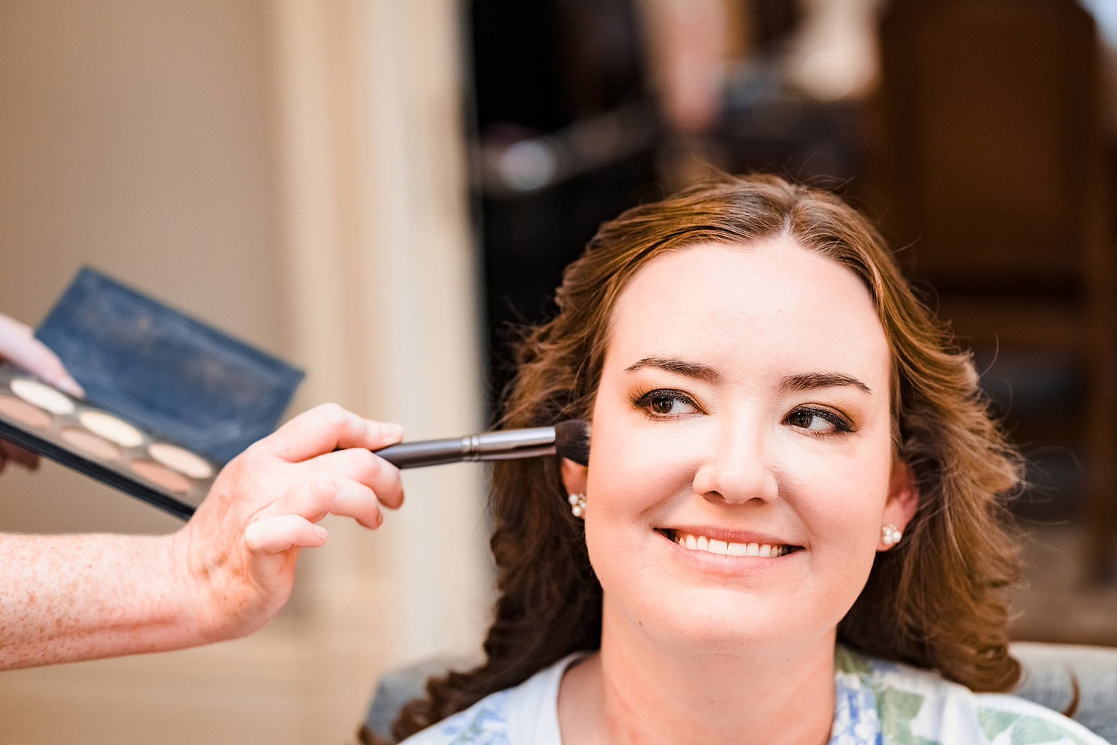 Bride gets her hair and makeup done by the Beauty and Bloom mobile beauty team