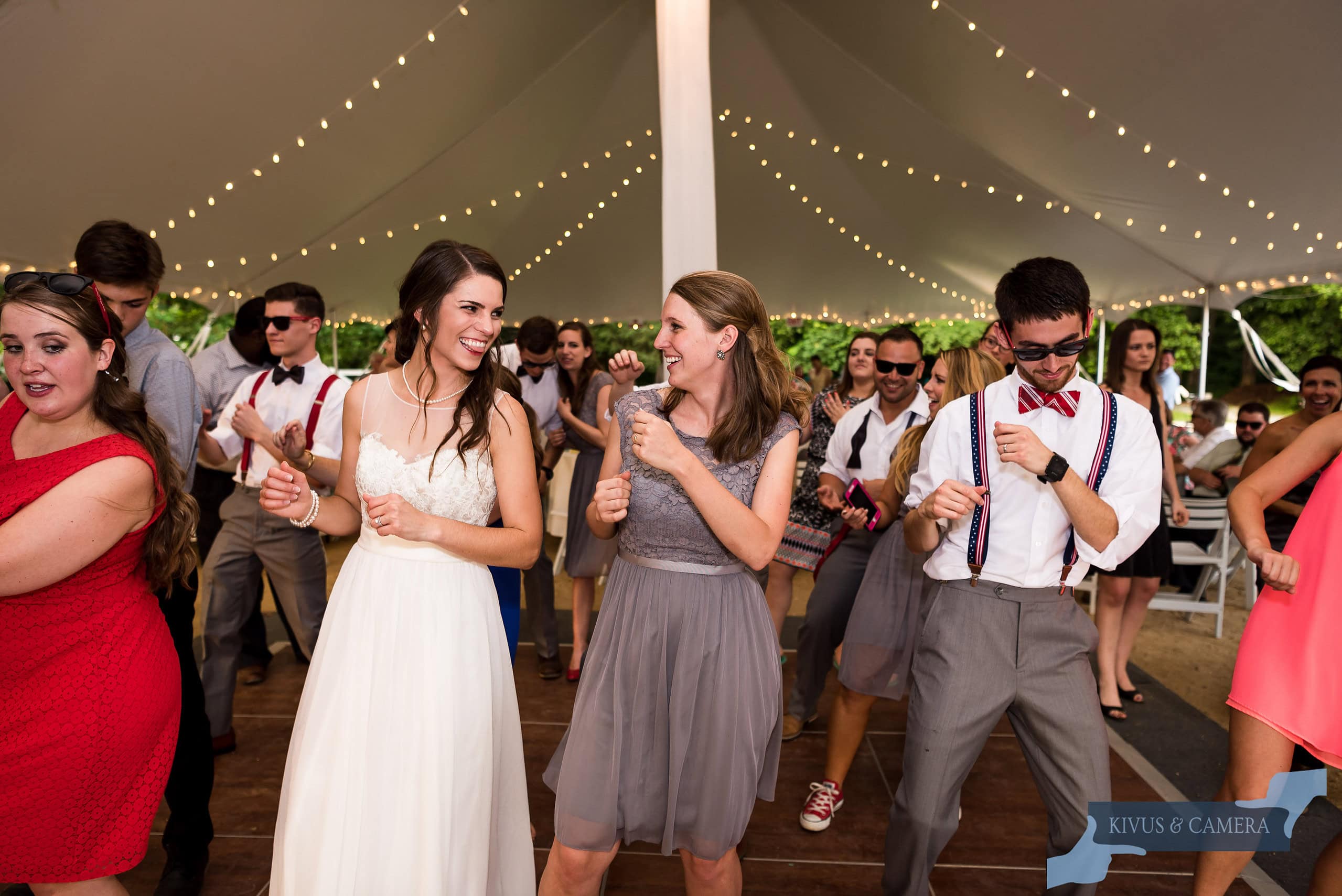 Bride dancing with sister