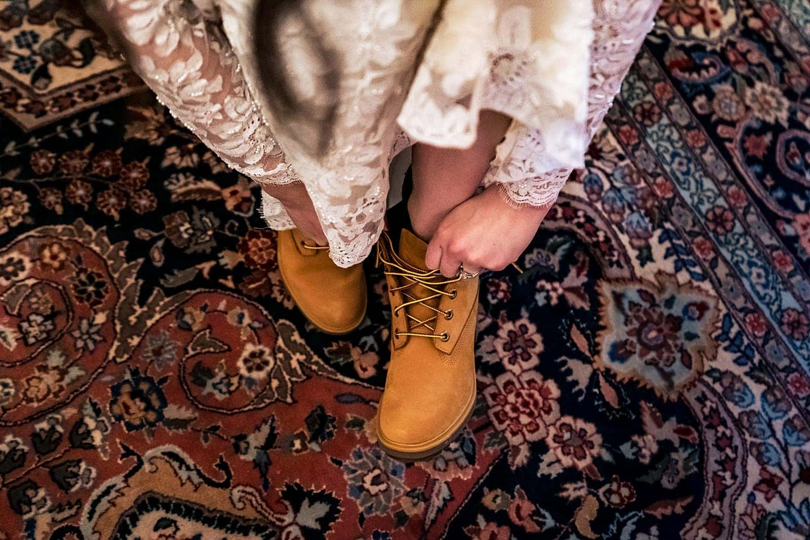 this bride wore timberlands under her wedding dress. Oh and that wedding dress was also worn by her grandmother and mother before her