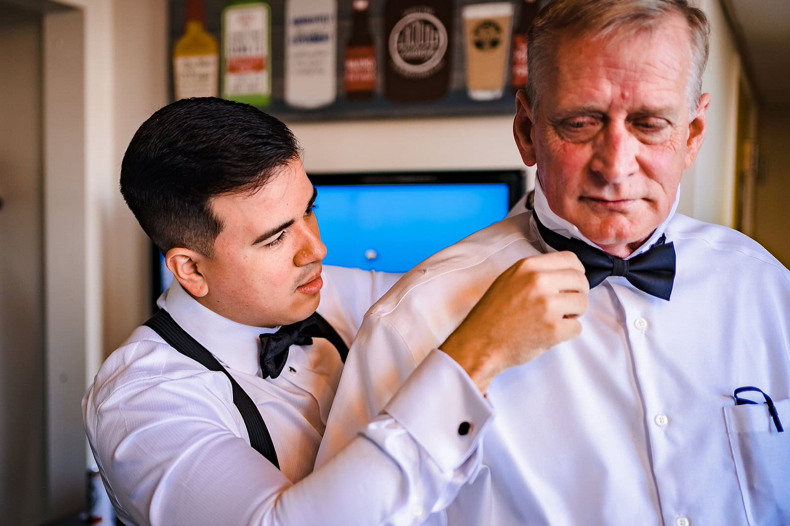 Groom gets ready at the Bull Durham Suite in Durham, NC