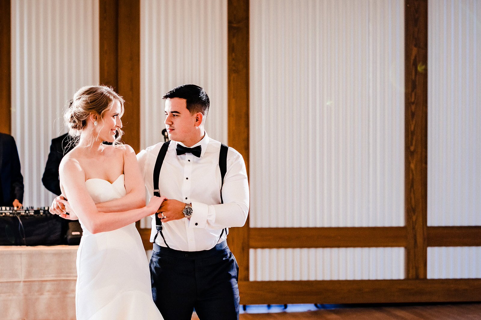 Couple shares their first dance at The Cotton Room in Durham, NC