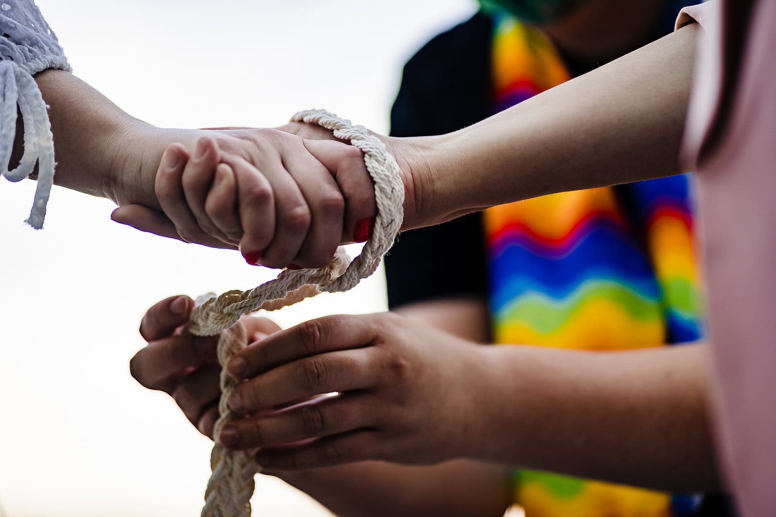 Magical Weddings by Carly performs a hand-fasting ceremony for two brides during their same-sex elopement in Raleigh, NC