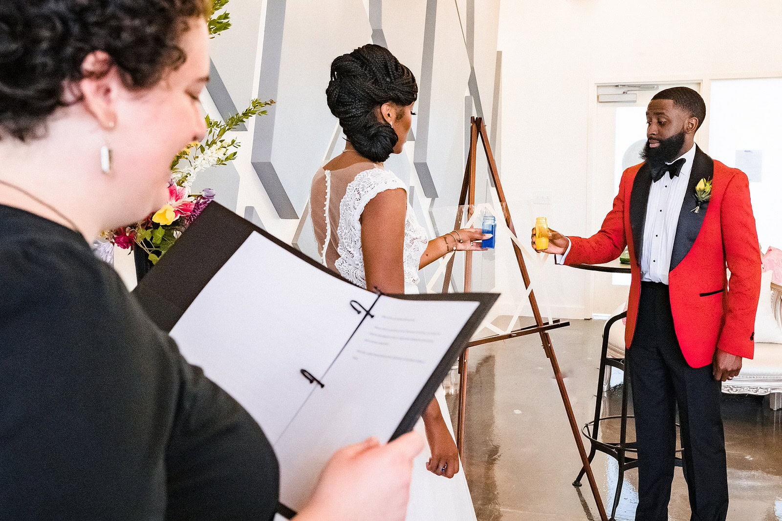 Painting unity ceremony during colorful wedding inspiration shoot