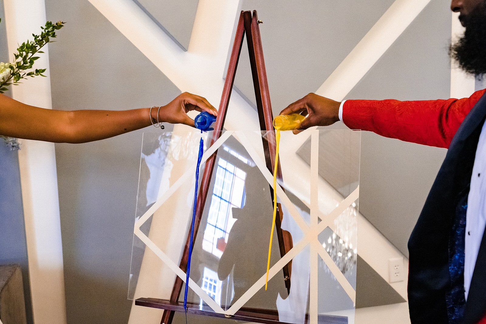 Painting unity ceremony during colorful wedding inspiration shoot