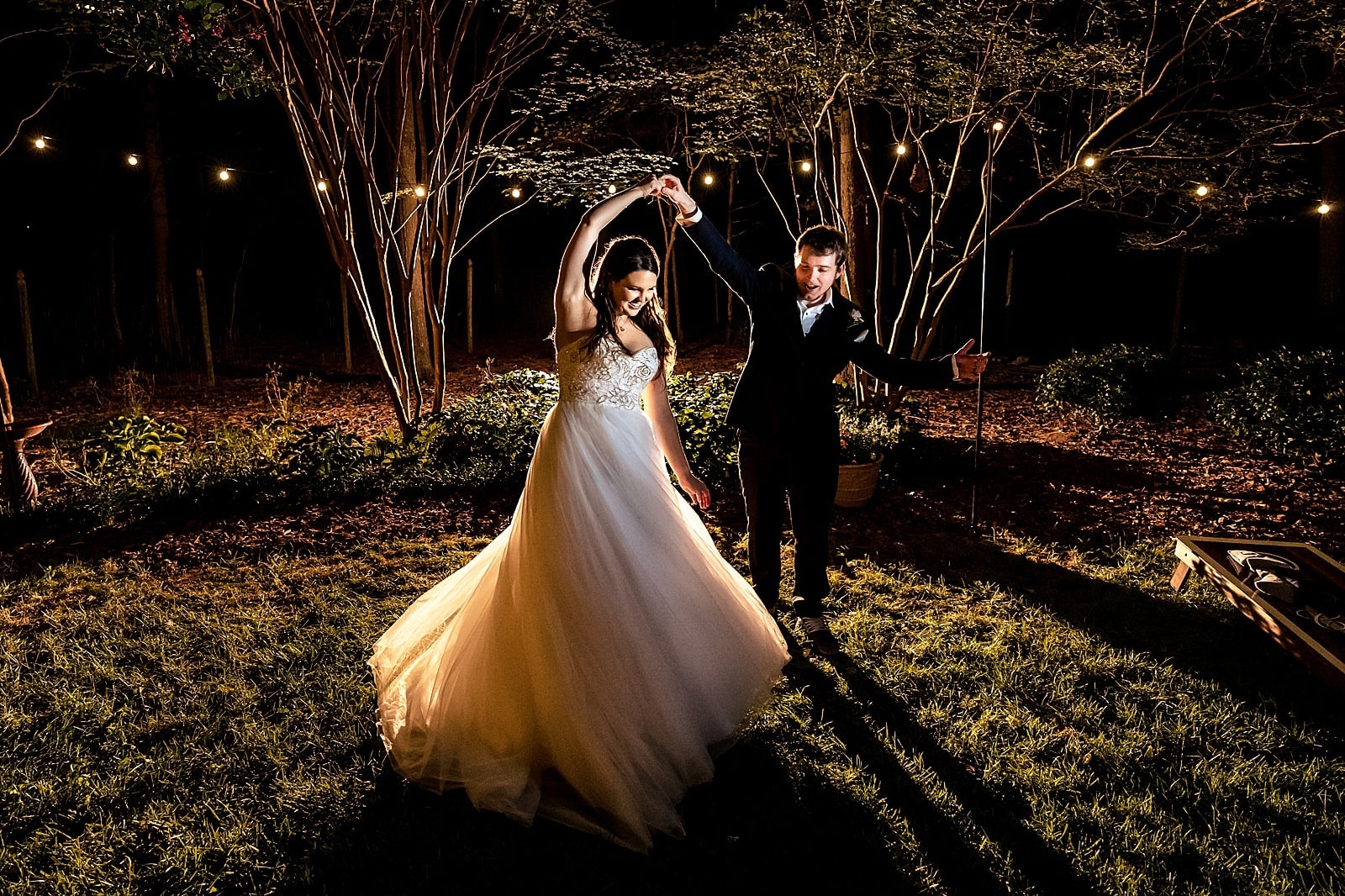 If you're having an al fresco wedding reception, make sure you get a photographer who knows how to light up the dark