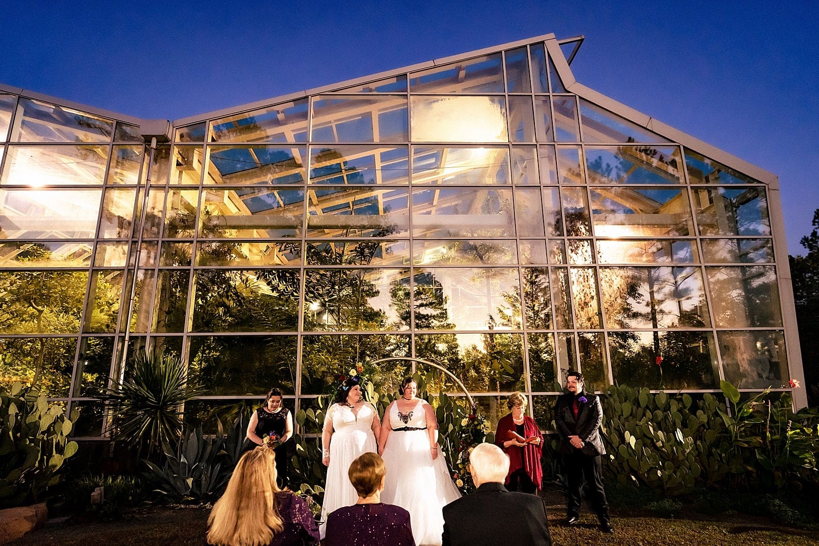 same sex wedding at Museum of Life and Science after dark