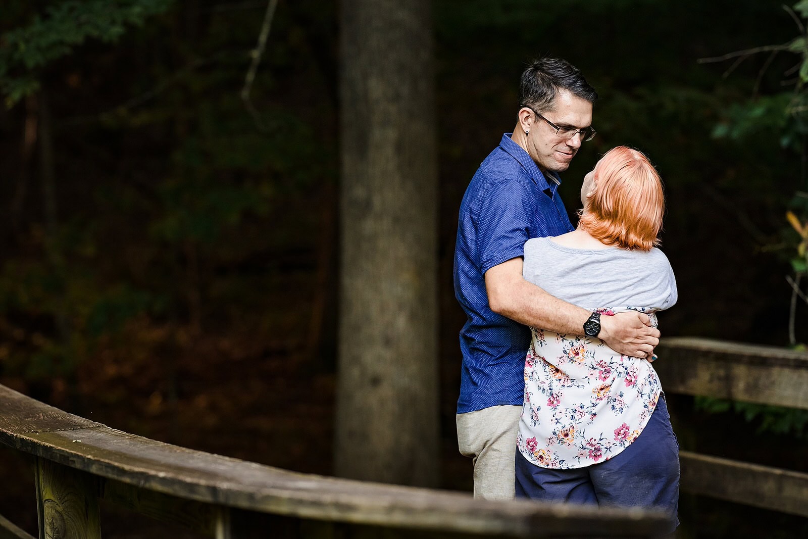 An engaged couple dances together during their Durham engagement photos