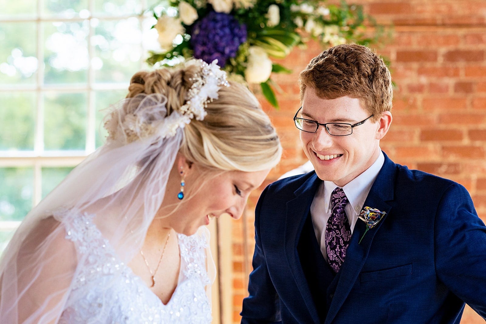 Bride and groom share a first look at The Cotton Room in Durham, NC