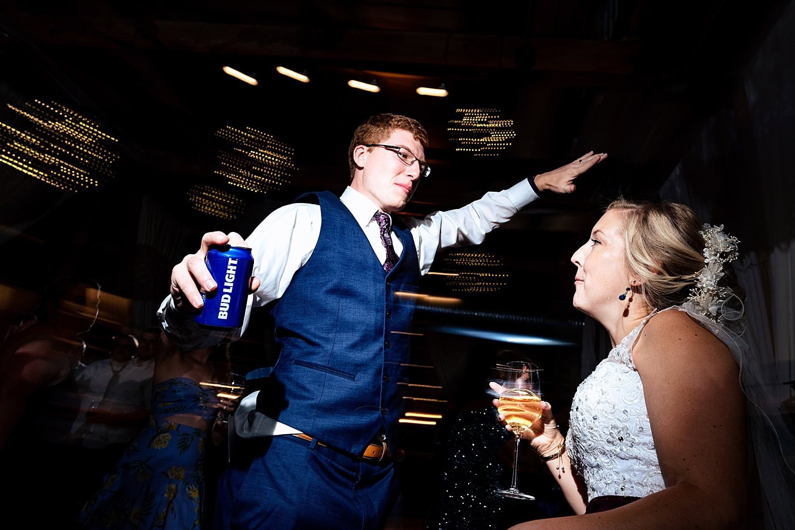 Bride and groom sing and dance at their fun wedding in Durham, NC 