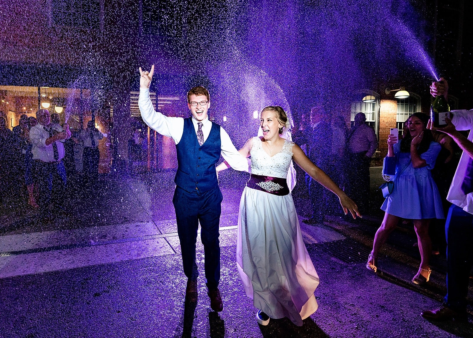 This couple had a champagne spray exit and it was AMAZING. Most fun wedding idea!!