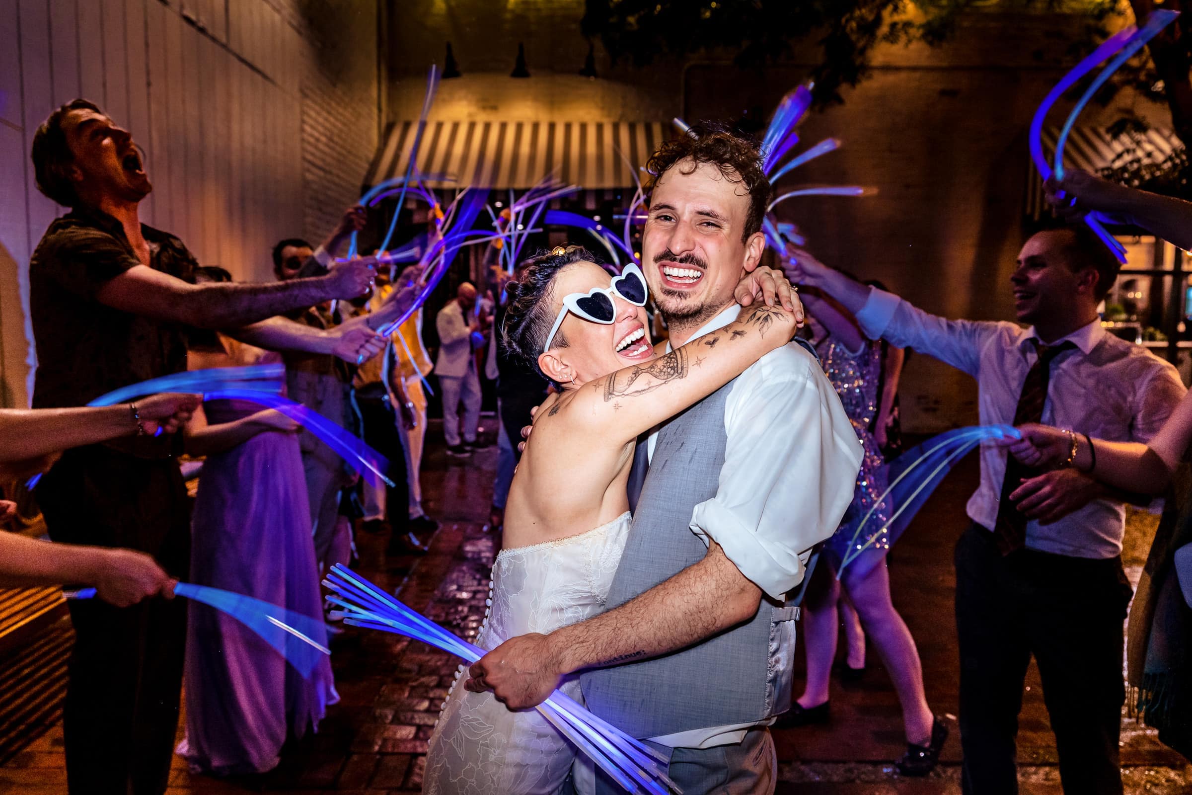 Glow stick wedding exit in the rain | Kivus & Camera