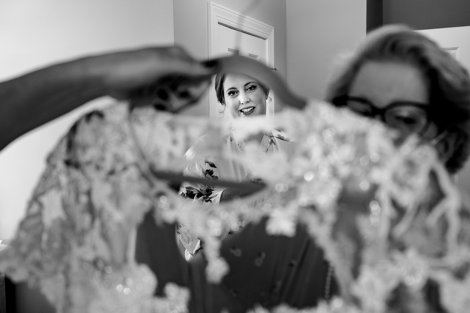 Something to consider: how do you get into your dress? Will that impact your hair? You may want your hair stylist to stay until you've got your dress on so she can do touchups if necessary