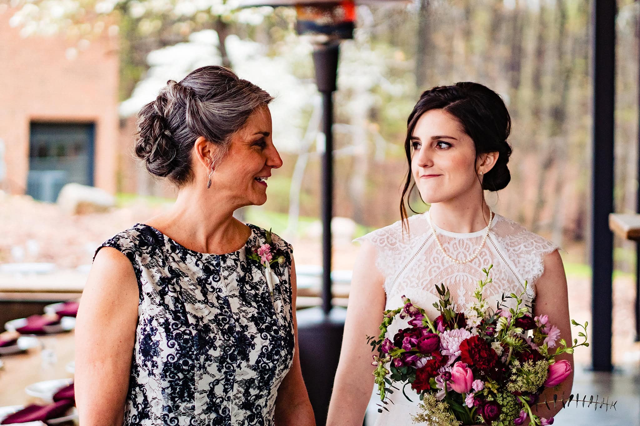 Mom walking bride down aisle
