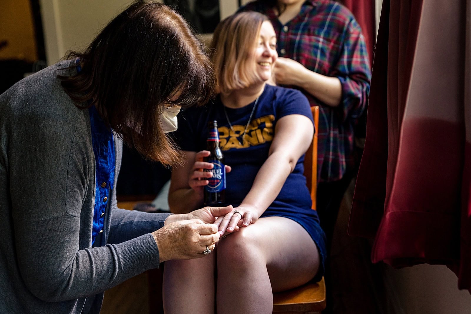 bride wears an awesome Don't Panic tshirt as she gets ready on her wedding day
