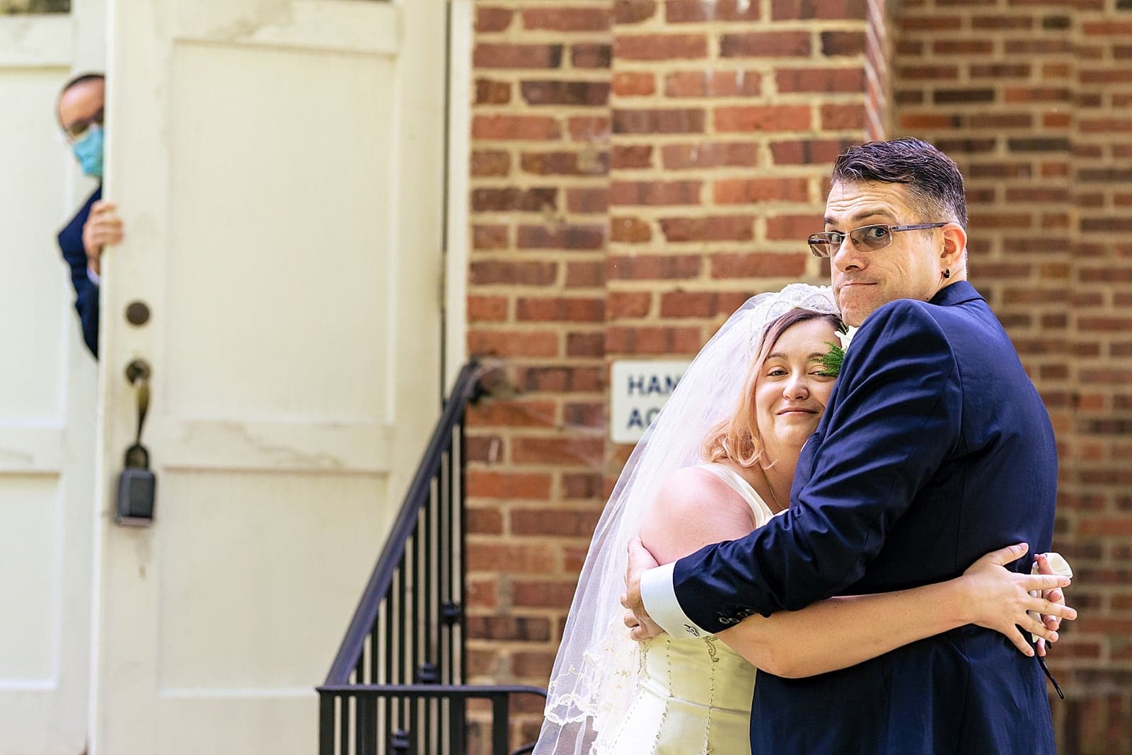 a friend of the couple accidentally photobombs their first look