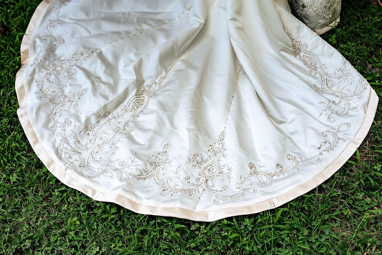 intricate detail on a wedding dress train