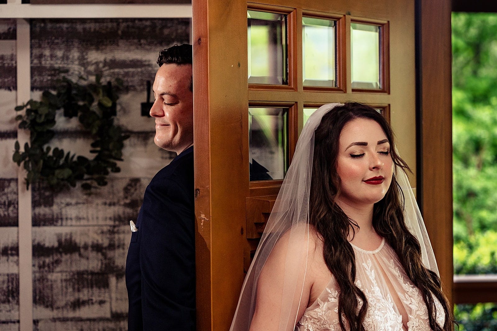 Couple's first touch at a misty mountain wedding in Asheville, NC | photos by Kivus & Camera