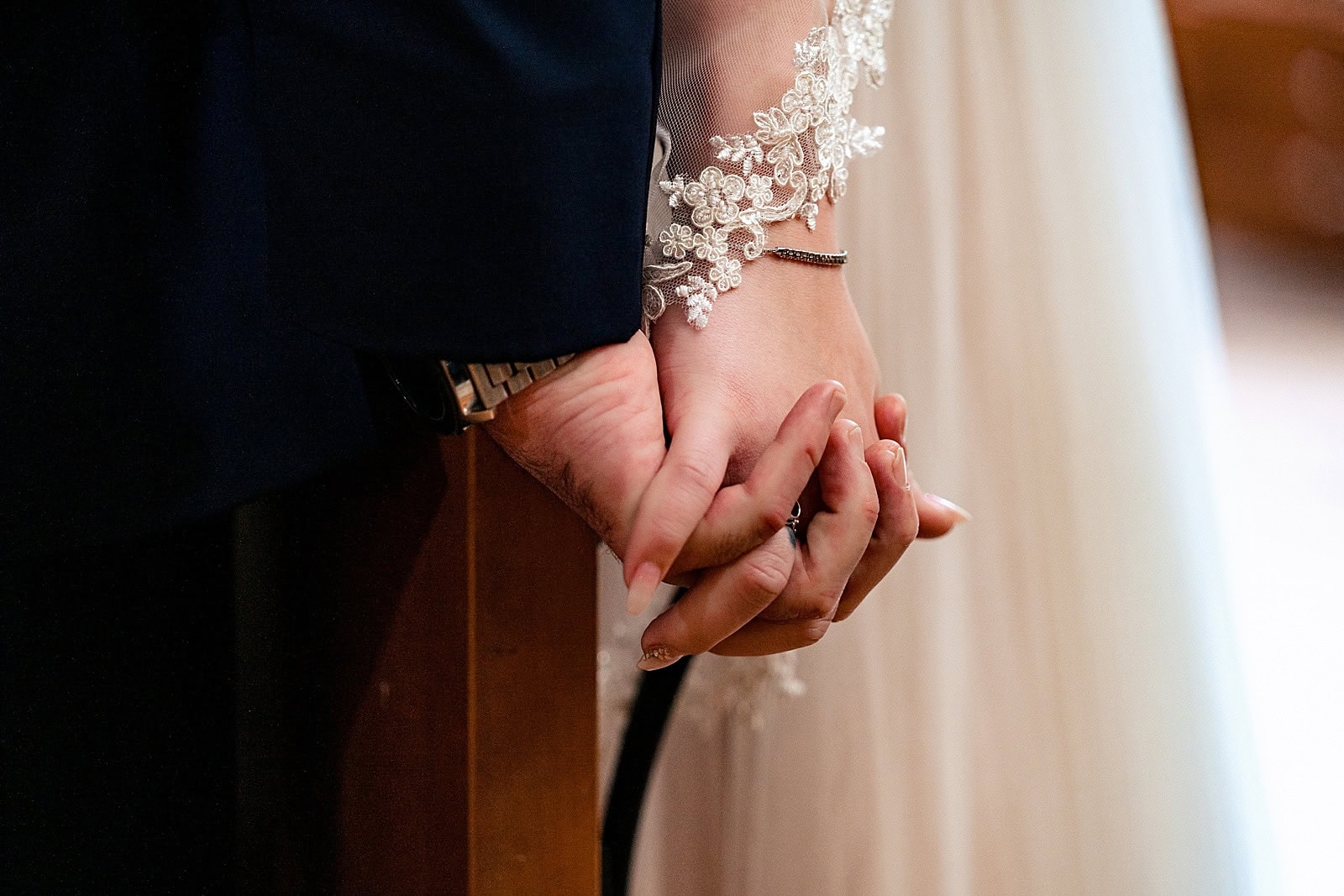 Couple's first touch at a misty mountain wedding in Asheville, NC | photos by Kivus & Camera