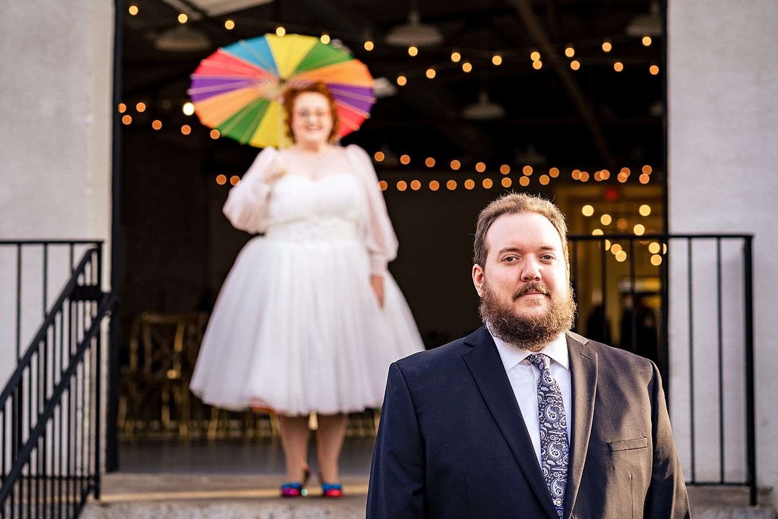This bride had a rainbow petticoat and a rainbow parasol and a rainbow veil and she's just the best - awesome nerdy Graham Mill wedding
