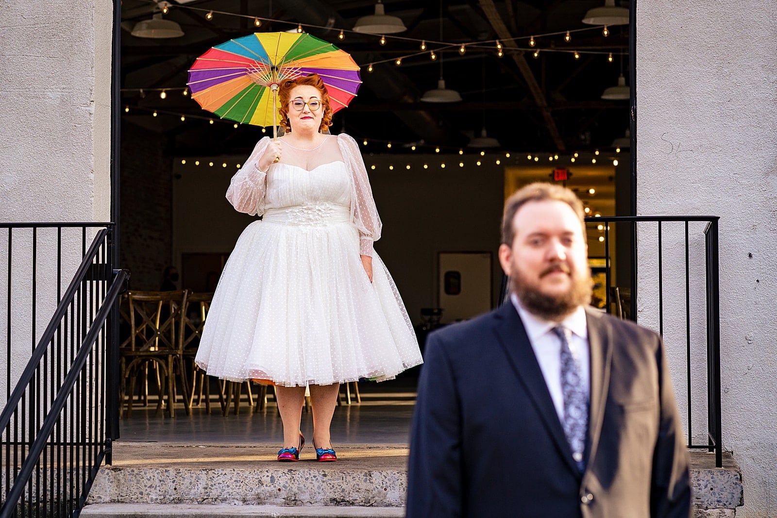 This bride had a rainbow petticoat and a rainbow parasol and a rainbow veil and she's just the best - awesome nerdy Graham Mill wedding