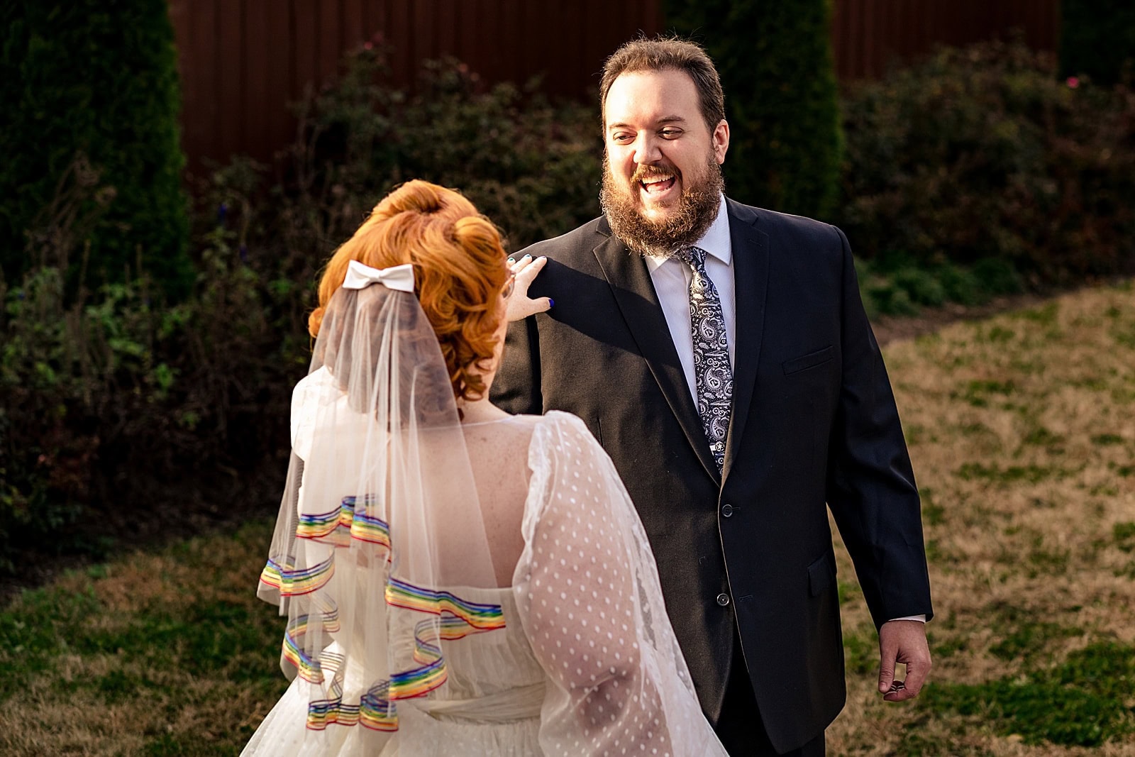 This bride had a rainbow petticoat and a rainbow parasol and a rainbow veil and she's just the best - awesome nerdy Graham Mill wedding