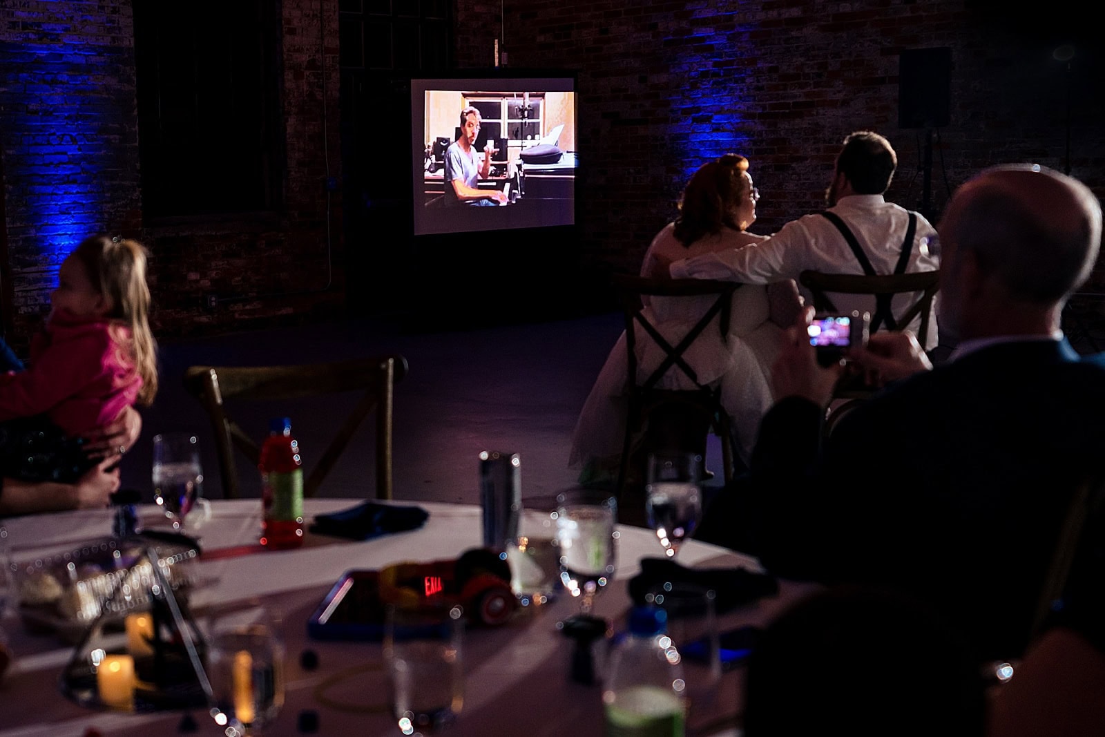 This bride is friends with Tony winner Jason Robert Brown and he recorded a special performance for the couple's intimate Graham Mill wedding