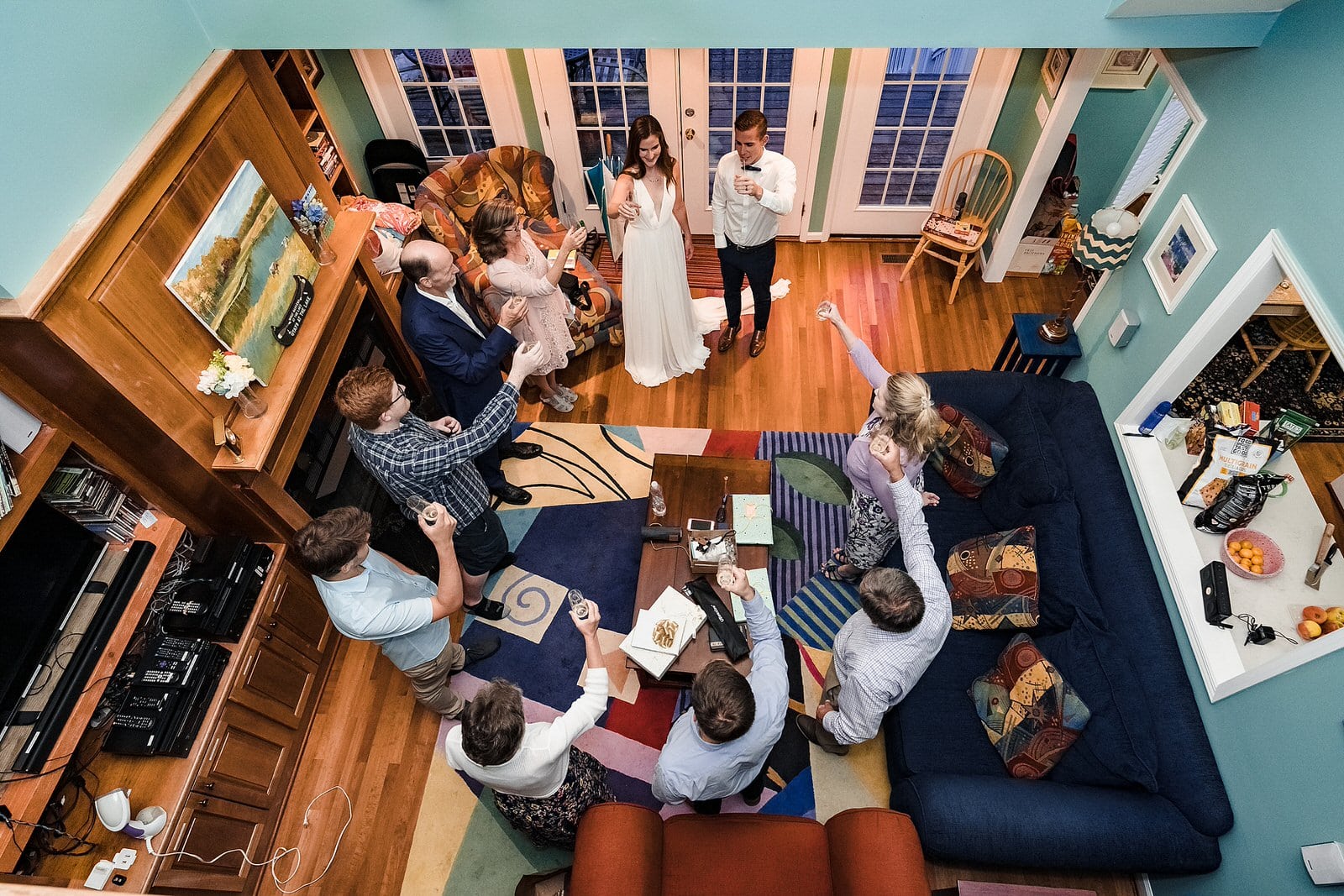 bride and groom laugh during toasts at this intimate AirBNB wedding