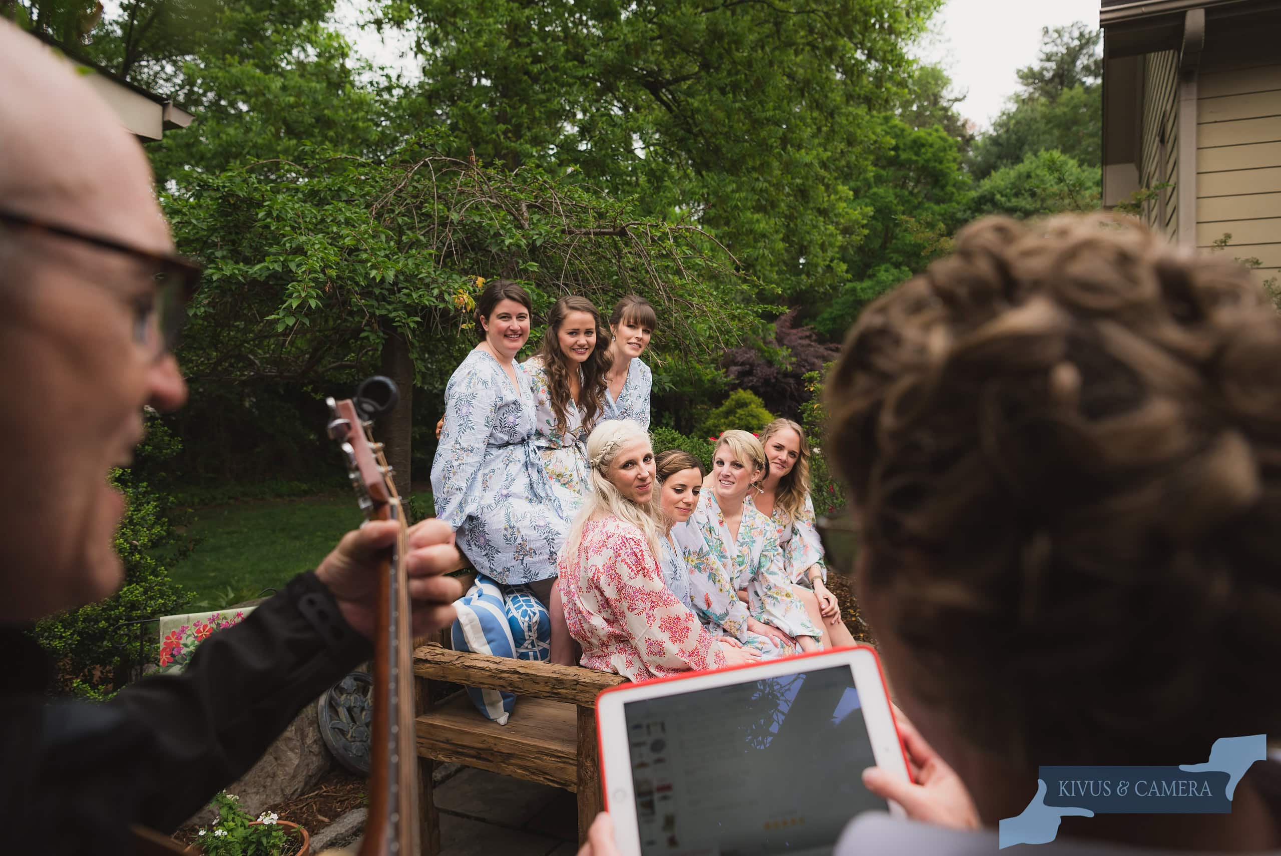 Bridesmaids being serenaded