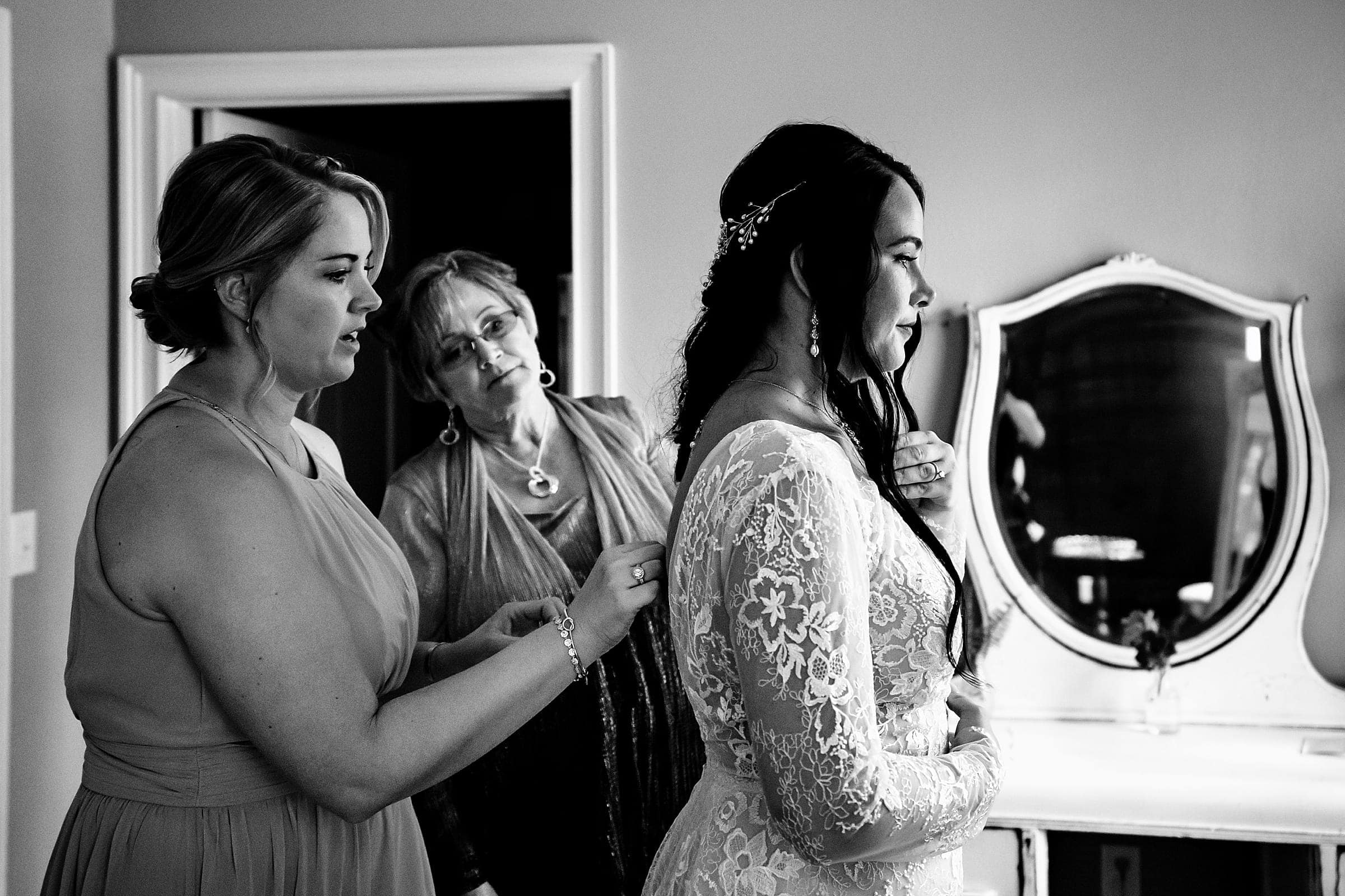 bride gets ready at a rustic vineyard wedding in North Carolina