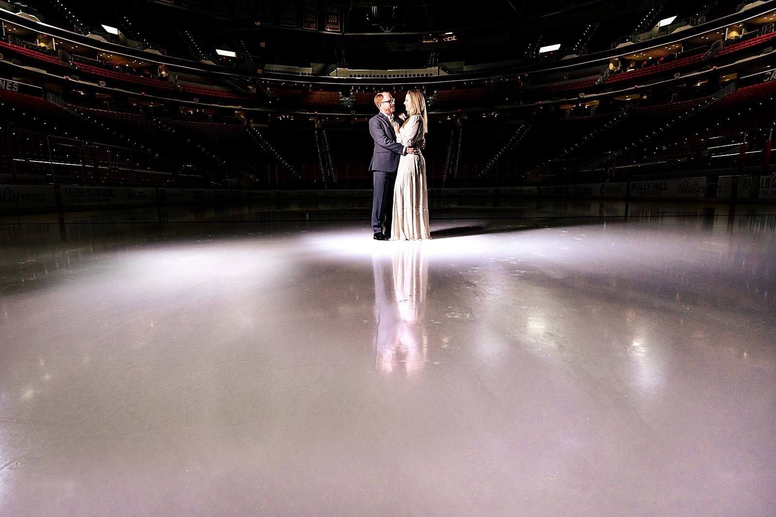 skating rink engagement photos in Raleigh, NC