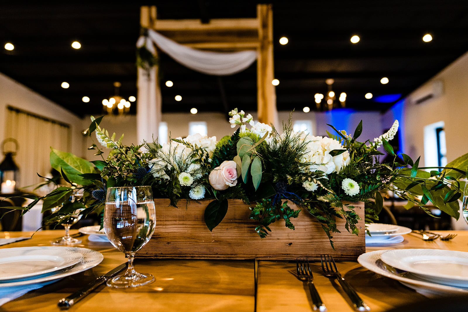 Green and white decor at The Meadows Raleigh wedding reception by Raleigh wedding photographers