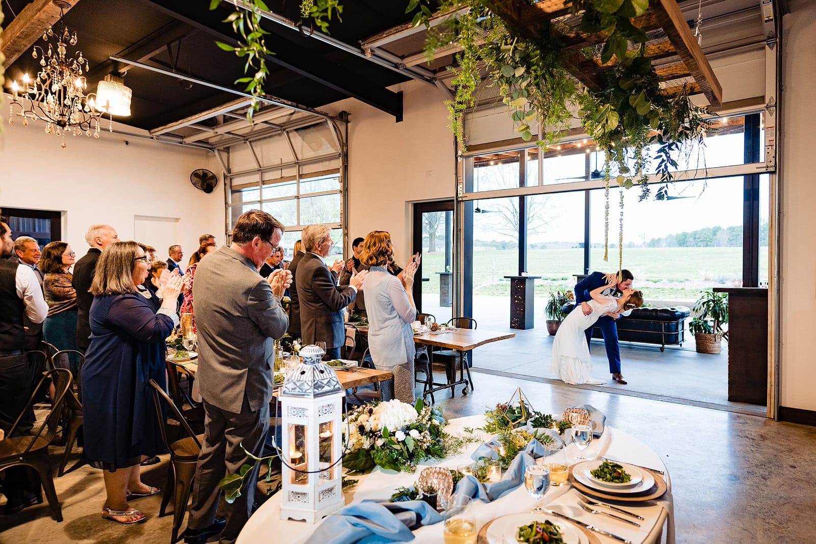Bride and groom enter their reception at The Meadows Raleigh