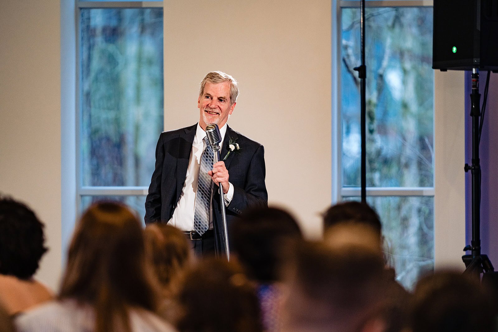 Father of the bride gives a toast at The Meadows Raleigh wedding reception