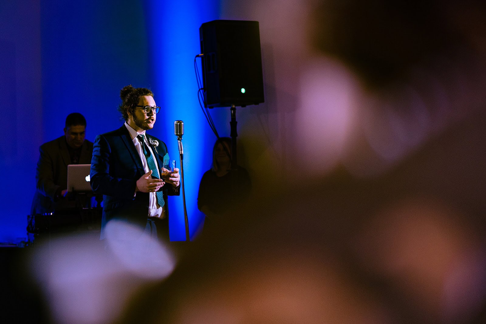 Brother of the groom gives a toast at a wedding reception at The Meadows Raleigh by Raleigh wedding photographers