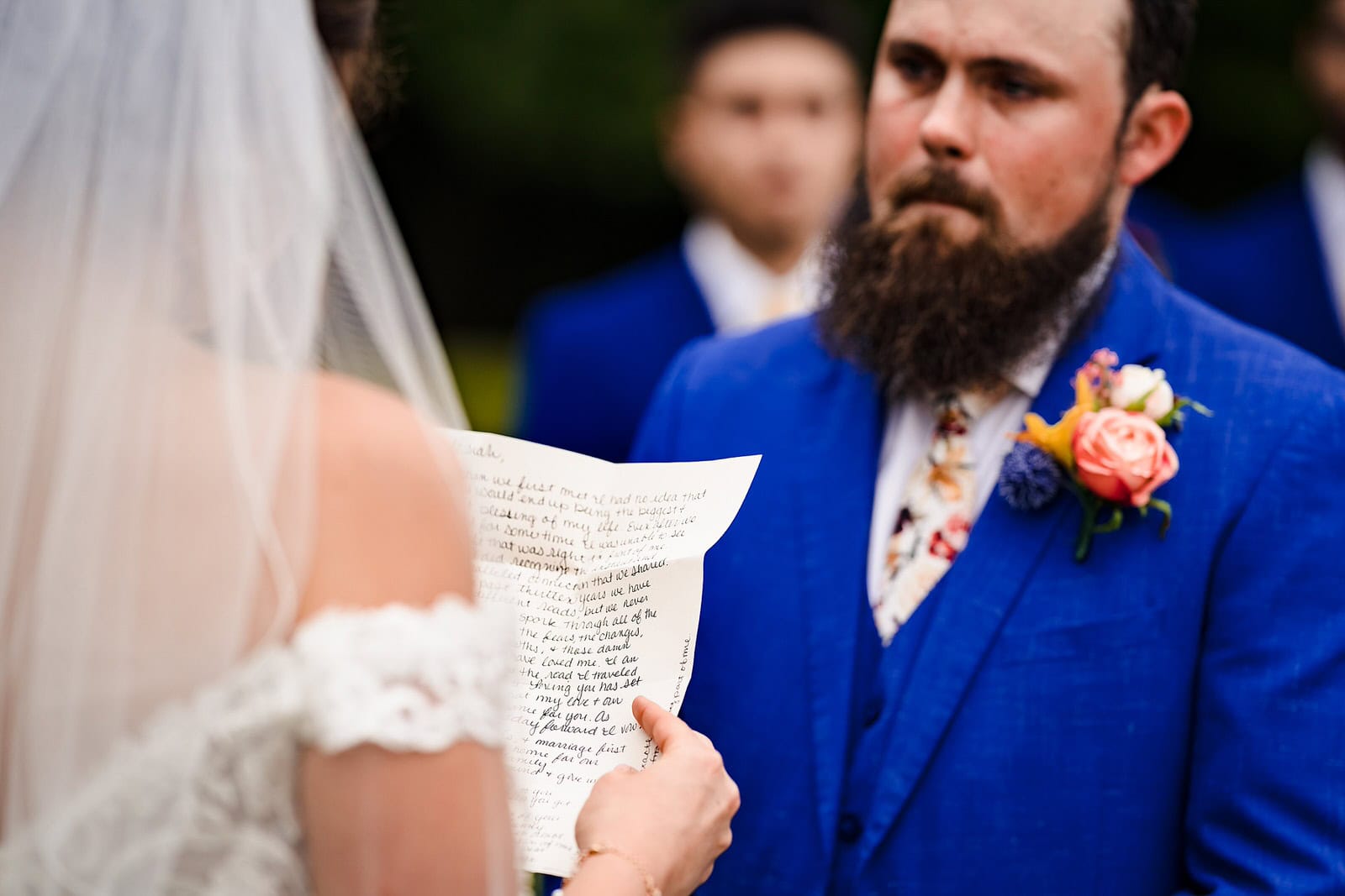 Bride and groom emotional vow exchange