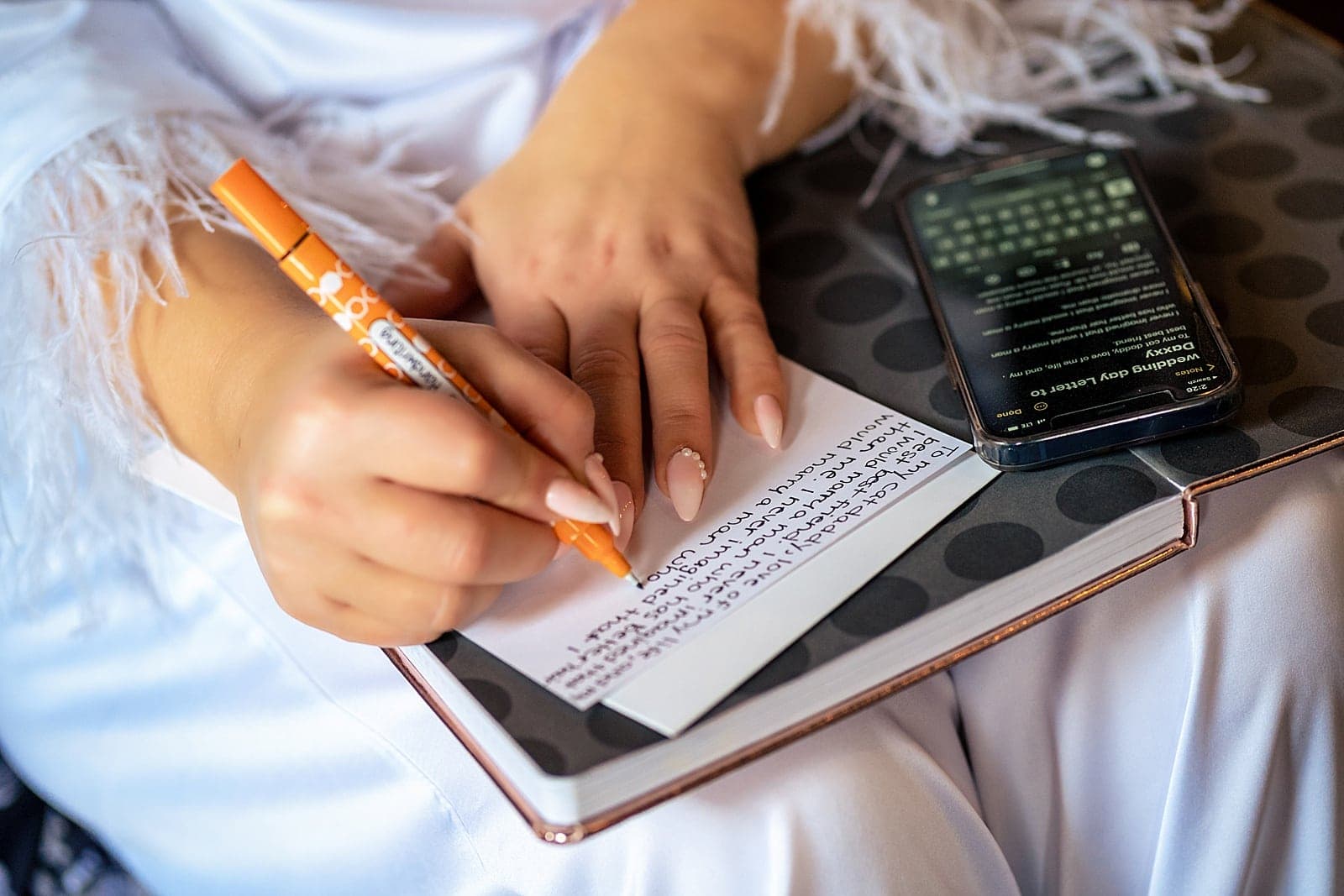 Bride writes out her vows on the morning of the wedding
