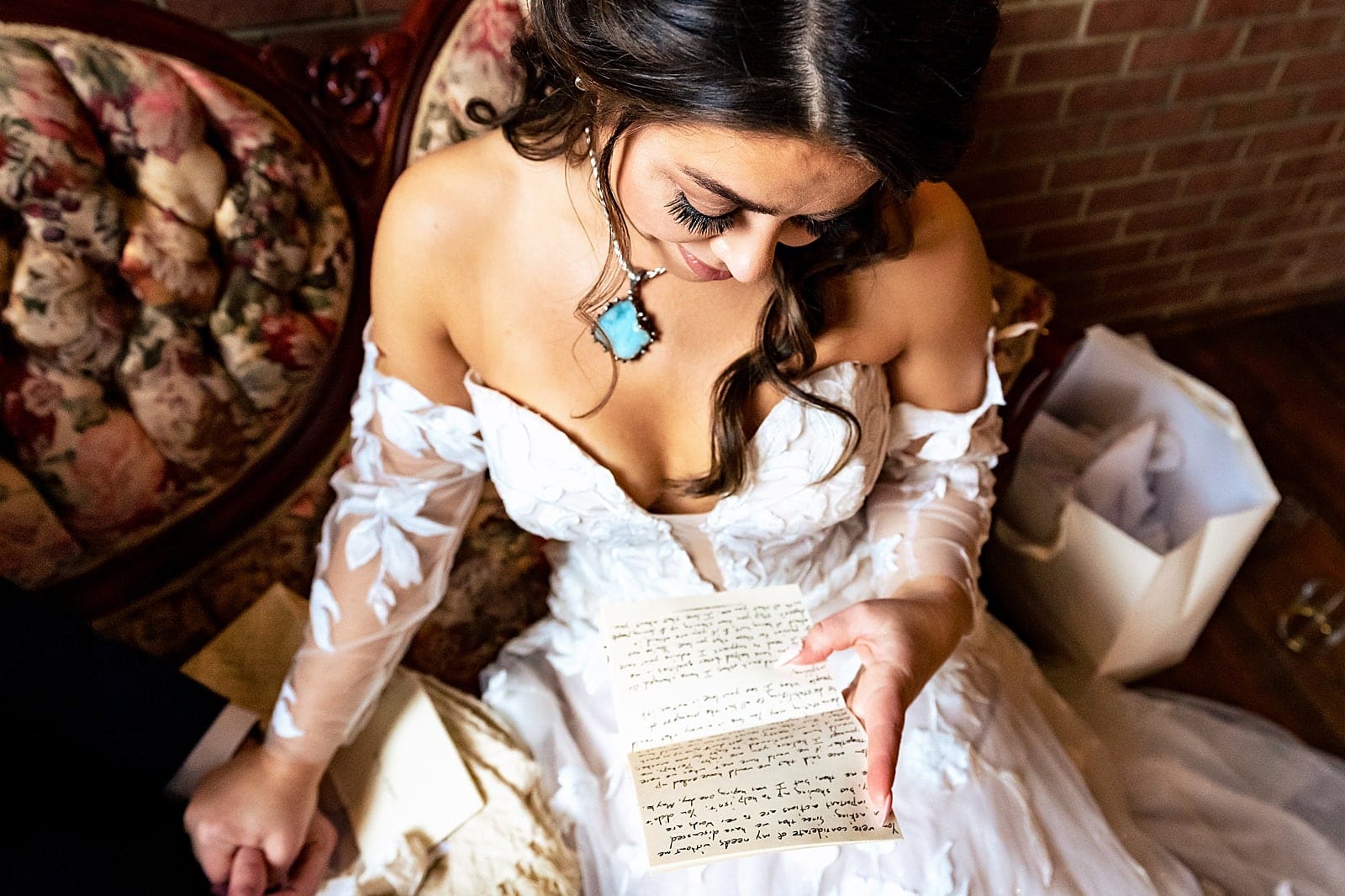 Couple exchanges letters and gifts before their wedding ceremony at Brick & Mortar Events in Clayton, NC