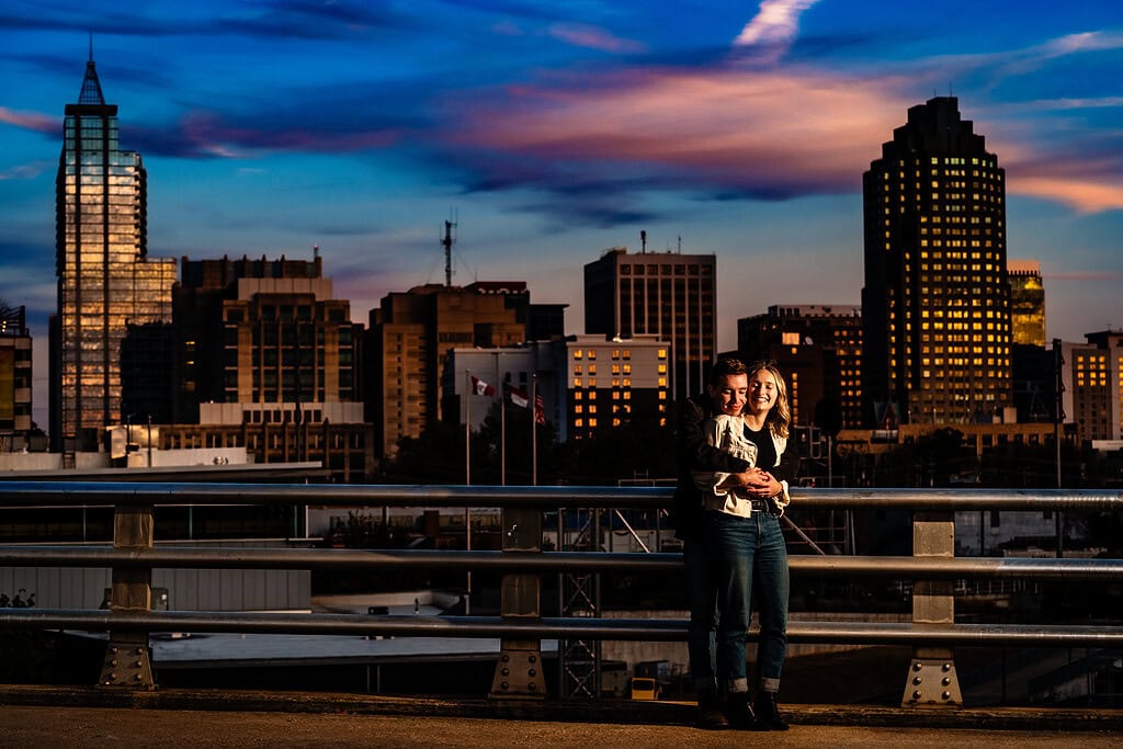 Raleigh engagement photos with the skyline | photo by Kivus & Camera