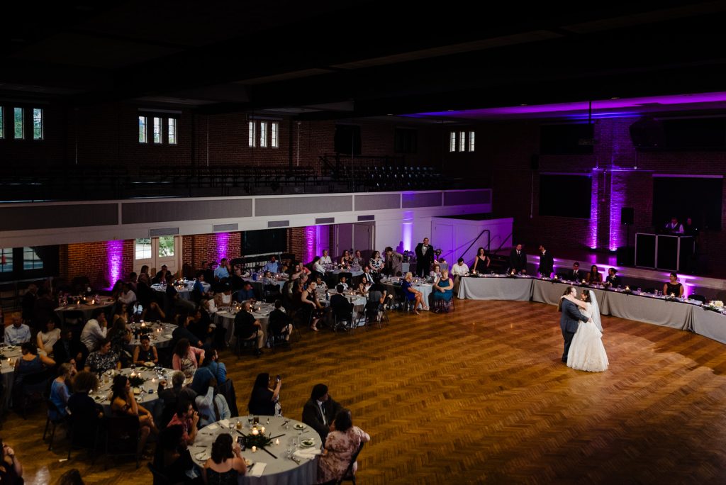 couple shares first dance at Durham Armory wedding