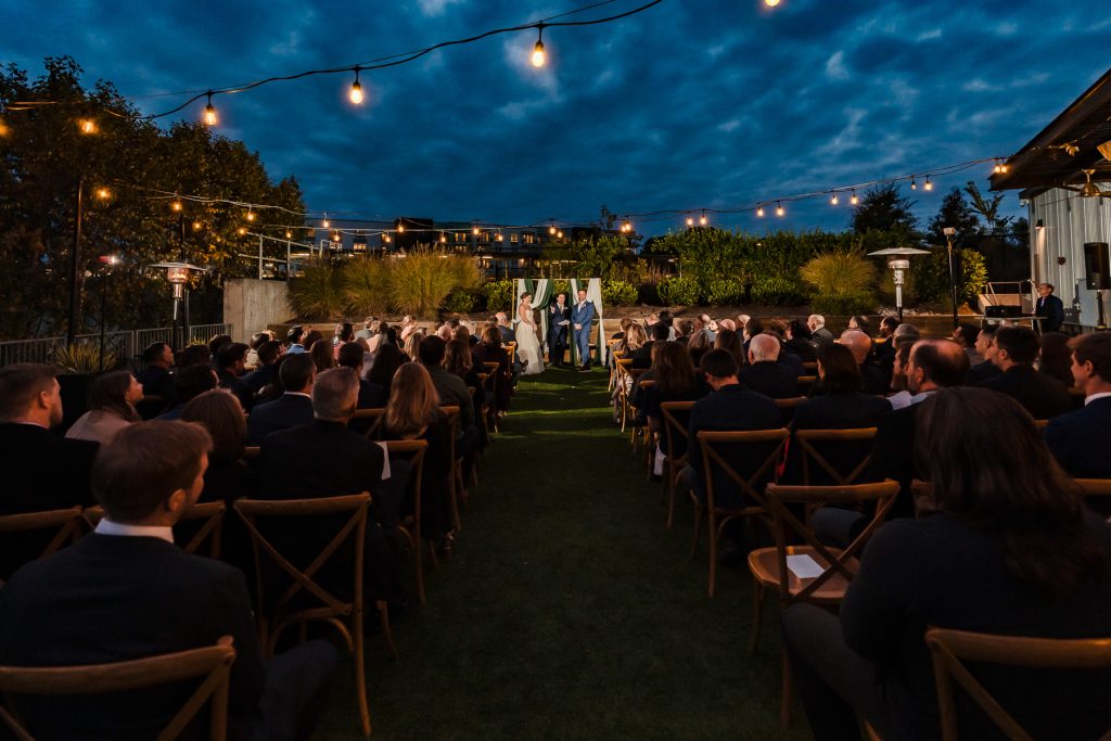 after dark wedding ceremony at Junction West in Raleigh, NC