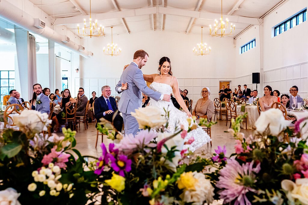 couple shares their first dance | Distillery NC wedding