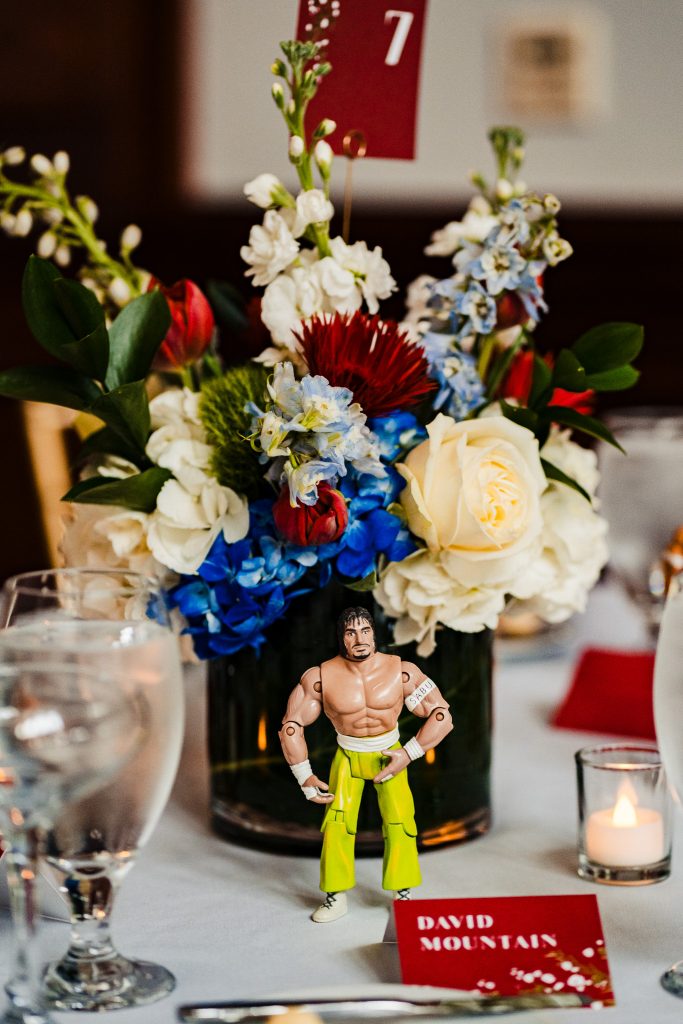 WWE wrestler action figure decorating a table at a wrestling fan wedding reception | photo by Kivus & Camera